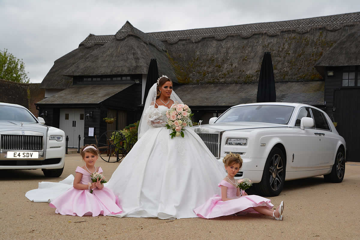 Rolls-Royce bridal car with bride and bridesmaids